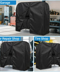 Ultimate Garage Game Changer Heavy Duty Tire Storage Rack with dust cover in a garage, holding four tires securely.