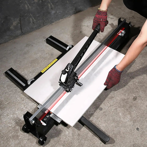 Person using Manual Tile Cutter With Sliding Head, 1200mm Max Cut, for porcelain ceramic and wall bricks on concrete floor