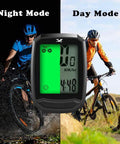 Wireless Bike Computer With Big LCD Display Waterproof Odometer showing night and day modes with cyclists in background.