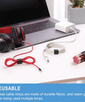 Huge 100 Pack 8 Inch Reusable Cable Ties With Hook And Loop Straps For Easy Cable Management And Cord Organization Adjustable Durable Nylon Five Colors Included For Home Office And Travel shown securing cables on a desk.