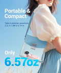 Portable Handheld Turbo Fan With 5 Gear Wind, Battery Operated, Up To 12 Hours Run Time inside a clear handbag outdoors