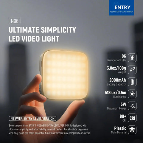 Entry Level Magnetic LED Camera Light with 96 LED Bi Color Panel held in hand, showing features like weight and battery.