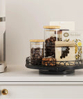 Smooth Spinning Nine Inch Solid Wood Lazy Susan Turntable with jars of coffee beans and snacks for kitchen organization.
