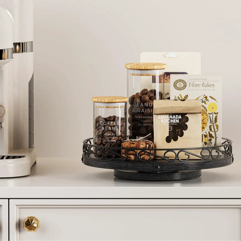 Smooth Spinning Nine Inch Solid Wood Lazy Susan Turntable with jars of coffee beans and snacks for kitchen organization.