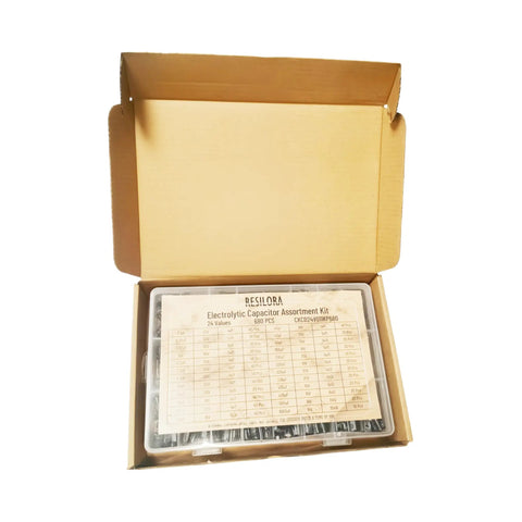 Dope Aluminum Electrolytic Capacitor Assortment Kit Loaded With 680 Pieces Over Twenty Four Values from an open box showing organized capacitors.