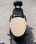 Hella Cozy Beige Plush Motorcycle Seat Cover With Super Warm Winter Fluffy Padding For Riders Seekin a Smooth Ride on black bike seat.