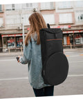 Lock Down Your Percussion Rig With This Straight Up Tough Oxford Fabric Dumb Drum Storage Bag And Snare Accessory Pouch Built Flat Out Durable For Gig Loads And Weekend Campout Shreds, shown being carried.