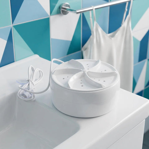 Portable Mini Turbo Washer Compact Automatic Laundry Beast For Dorm Rooms And Apartments Travel Friendly Design That Slaps With Rapid Spin Cycle Making Clean Clothes A Breeze On Any Vibe on a sink countertop.
