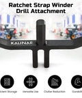 Black Ratchet Strap Winder Drill Bit Attachment for Effortless Tie Down Rolling, shown in a garage backdrop