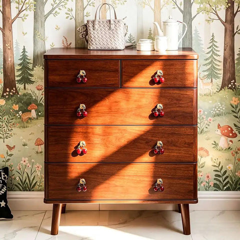 Dope Red Cherry Cabinet Knobs Pack For Kitchen Drawers And Dressers, Sturdy Zinc Alloy Furniture Pulls With Quick Single Hole Installation, Fresh High Quality Home Hardware Refresh on wooden dresser with forest wallpaper.
