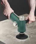 Heavy Duty Pneumatic Angle Grinder With Variable Speed And Tank Build For Stainless Steel Polishing And Granite Shaping No Fuss Hookup One Quarter Inch Air Inlet Daily Driver Shop Workhorse Tool in action on wet granite surface.
