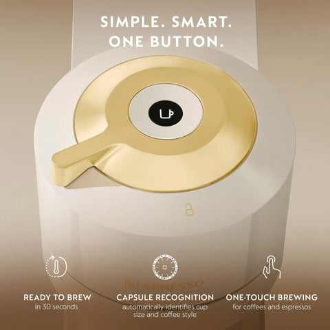 Top view of Vertuo Next Coffee And Espresso Maker By DeLonghi In Creamy White With Gold lid showing one-button operation features