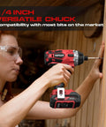 Person using 20V Max Lithium Ion Impact Driver With One Quarter Inch Quick Connect Chuck on wooden surface