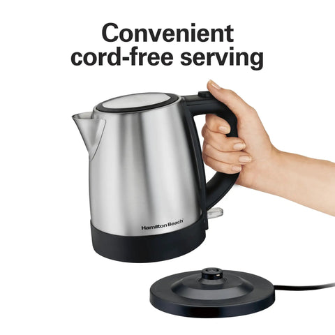 Hand holding Electric Tea Kettle Cordless 1 L Water Boiler And Heater With Auto Shutoff And Boil Dry Protection Stainless Steel