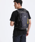 Person wearing 20L Lightweight Hiking Backpack for Men and Women, Daypack for Travel and Outdoor Adventures, Durable 600D Polyester