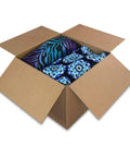 Rock Solid Large Cardboard Moving Boxes For Easy House Moves And Reliable Storage Heavy Duty Corrugated Packing Cartons With PreCreased Fold Flaps filled with colorful fabric.
