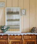 Top Shelf 10 Pack Solid Brass Cabinet Knobs Sleek Round Ball Hardware With Slick Brushed Gold Finish on wooden dresser