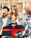 Family gifting Ultimate 26 Piece Stainless Steel BBQ Grill Tools Set With Storage Bag to a smiling dad.