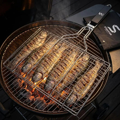 Outdoor Grill Basket For Fish, Shrimp, Veggies And Meat, Stainless Steel With Detachable Heat Resistant Handle, Lockable Design For Easy Grilling, Camping Cookware, Versatile Grilling Rack showing fish over open flames