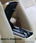 Hard Shell Tech Travel Case With All In One Cable Organizer And Mesh Pockets To Keep Your Adapters Power Banks External Drives And Memory Cards Locked Down And Ready For Any Daily Hustle Or Weekend Cruise Black in a car's center console.