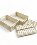 Top Shelf Foldable Storage Bins Four Pack Hella Space Savers For Tiny Apartments Dorm Rooms And Closets Easy Flat Fold Plastic Organizer Crates With Secure Lids Beige, showcasing beige bins and lids.