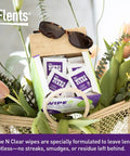 Pre Moistened Lens Cleaning Wipes For Glasses And Shades Gentle Streak Free Fast Drying Individually Wrapped Travel Ready Packs Four Boxes 300 Wipes Total Safe On Coatings Made In USA in a basket with sunglasses and flowers