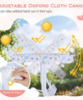 Adjustable Oxford cloth canopy of two-seater kids patio swing with white elephant pattern in sunny garden