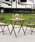 Sturdy Foldable 27 Inch Square Card Table with 400 Lb Capacity set up outdoors near RV with chairs and glasses