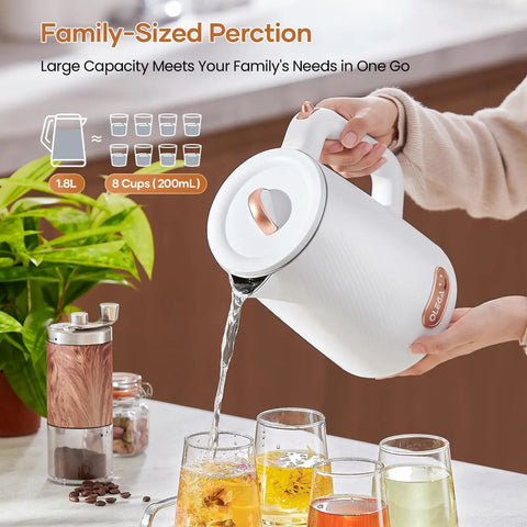 Fast Boil Electric Kettle 1500W 1.8L Stainless Steel Auto Shut Off Boil Dry Protection Perfect For Coffee And Tea Quick Hot Water For Breakfast And More being used to pour water into glasses