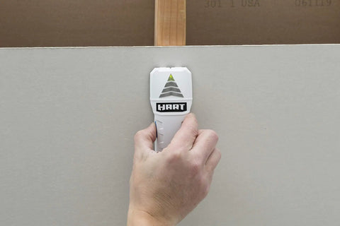 No Sweat Electronic Stud Detector With Three Sensor Heads Accurately Snags Wood Studs And Metal Objects Up To One Inch Deep Fast Easy Wall Locator For Smooth Sail Diy Renovations in use against a wall.
