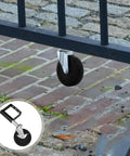 Heavy Duty Rubber Iron Caster Wheels For Metal Gates Featuring Spring Loaded Gate Support Design With Quiet Rolling Action and Smooth Glide Performance Built Tough mounted on a gate.