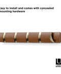 Flip Wall Mounted Coat Rack With Retractable Hooks in light walnut and gold, side view showing concealed mounting hardware.