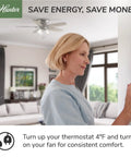 Woman adjusting thermostat with 52 Inch Indoor Ceiling Fan With LED Lights Fresh White, Pull Chain, 5 Blades in living room