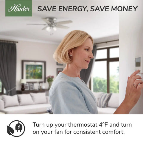 Woman adjusting thermostat with 52 Inch Indoor Ceiling Fan With LED Lights Fresh White, Pull Chain, 5 Blades in living room