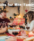 People exchanging gifts at a festive dinner table with holiday decorations and candles, text reading 'Gifts for Men/Family'