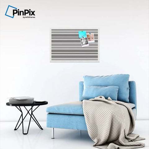 Custom Printed Canvas Bulletin Board With Graphite Grey Bold Stripe Design, 30 By 20 Inches, Framed In Satin White Frame, above chair