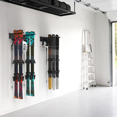 Badass Heavy Duty Garage Wall Mount Ski Rack Holds 4 Pair Wide Or 8 Pair Narrow Skis With Secure Double Prong Hooks, ski rack holding colorful skis.
