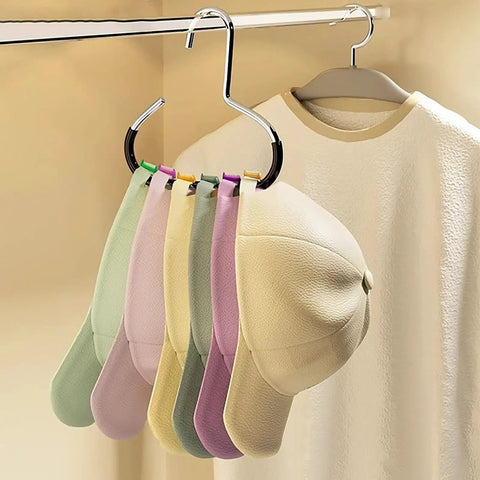 Heavy Duty 2 Pack Hat Organizer For Baseball Caps And Leather Totes Stainless Steel Closet Rack with pastel caps hanging.