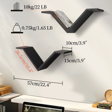 Super Sleek Black Wall Mount Bookshelf Set Of Two With Sweet Wing Shaped Design That Offers Hella Spacious Storage While Giving Your Space Total Modern Vibes. Features measurements and books displayed.