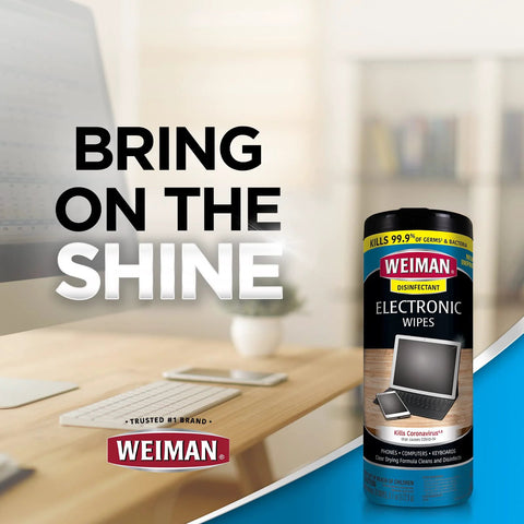 Weiman electronic screen cleaner wipes bottle on desk beside laptop, front view.