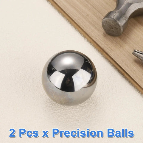 Bulletproof Build Two Inch Chrome Steel Bearing Balls G25 Precision Mirror Finish on a work surface with tools.