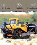 Proportional One Sixteenth Scale RC Bulldozer Toy With Four Wheel Drive Front Loader on outdoor dirt with size dimensions shown