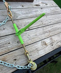 Towline Tough 8 Pack Hi Vis Green Ratchet Chain Binders With Grab Hooks For Daily Flatbed Haulin And Truck Trailer Tie Downs showing a green ratchet binder on a wood surface.