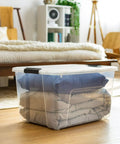 Straight Up Heavy Duty Clear Storage Bins Secure Snap Closure Stackable Plastic Totes For Bulky Seasonal Gear 60 Quart Capacity 22 X 16 X 12 Inches 2 Pack with blankets inside.