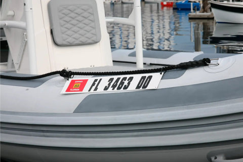 Marine Registration Plate Kit For Inflatable Boats And Ribs No Glue Needed 4 By 24 Inch ABS Mounting Boards With Zip Ties Saltwater Resistant Made In USA Pair displayed on inflatable boat