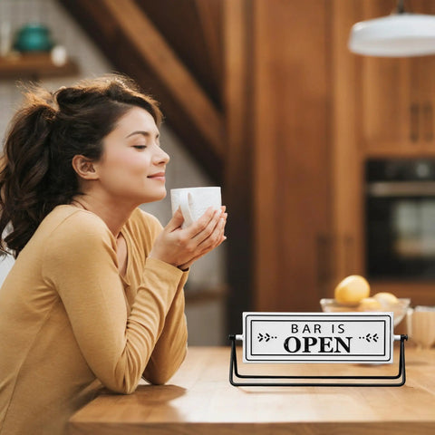 Smooth Flipping Open Closed Sign, Handmade Metal Counter Decor For Your Cozy Home Bar Or Office Coffee Spot With Black Stand And Embossed Lettering Straight Up Real Deal on a kitchen countertop.