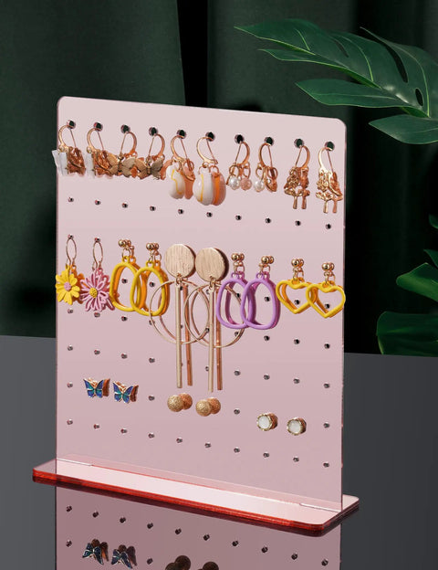 Rose Gold Mirror Finish Acrylic Earring Stand Three Pack Set displaying various earrings on tabletop