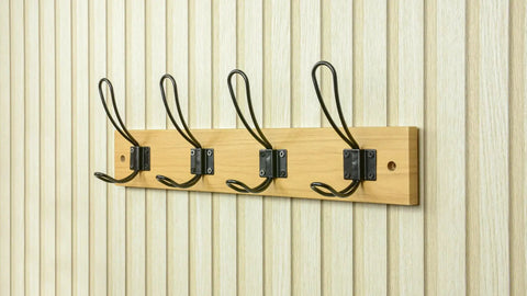 Super Sturdy Wall Mounted Coat Rack With Four Heavy Duty Hooks To Keep Clutter In Check Holds jackets and bags beautifully.