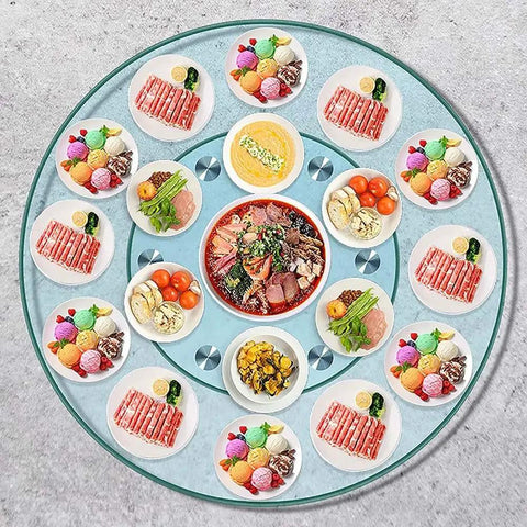 Smooth Spinning 36 Inch Glass Lazy Susan Round Rotating Turntable For Dining Tables serving various dishes and desserts.
