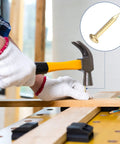 Person using a hammer to drive a tiny brass nail into wood, showcasing 100 Pack Tiny Brass Nails 1.2 Mm X 10 Mm Round Head Precision Hardware For Woodworking Diy Crafts Picture Hanging Rust Proof Corrosion Resistant Household Fixing Straight Up Killer Hardware That Never Flops.